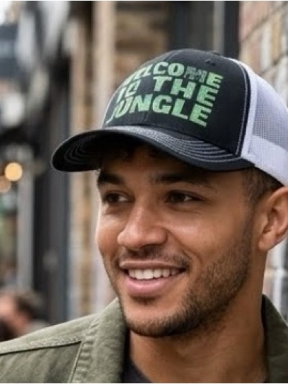 OTTO Black & White Trucker Cap with Green 'Welcome to the Jungle' Text